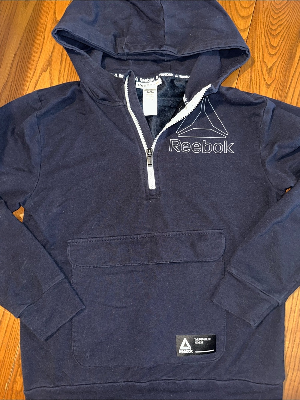 Dark blue Reebok half‑zip hoodie